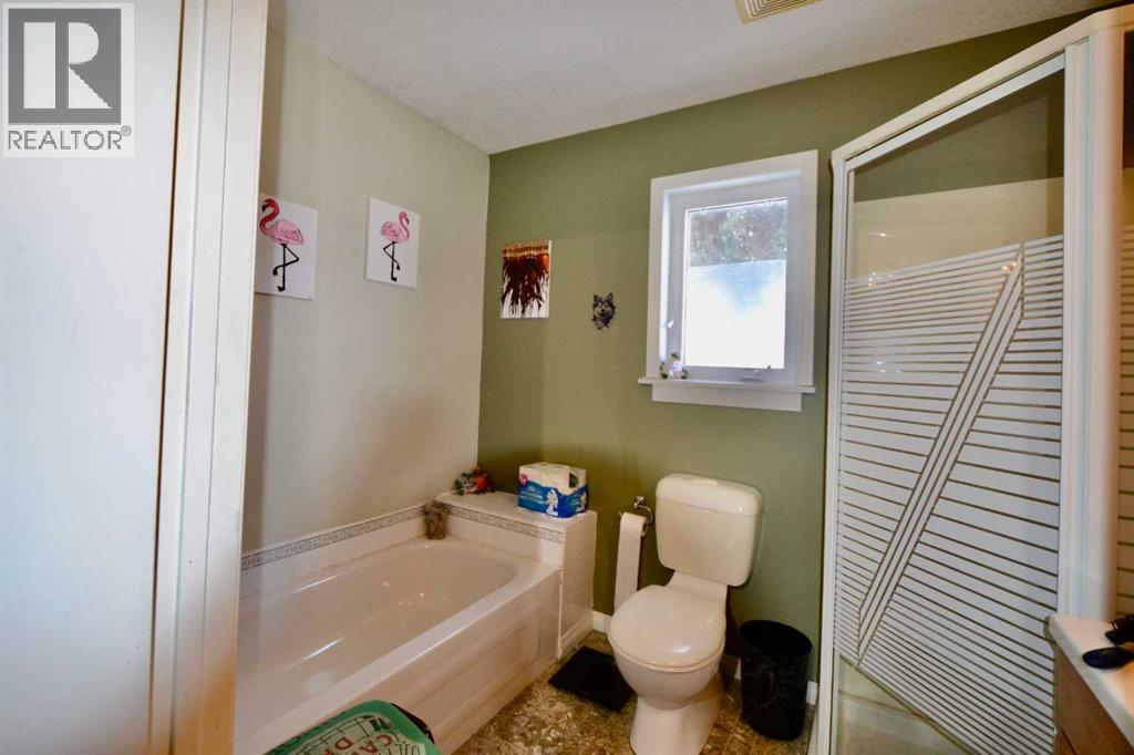 660 1 Avenue, Irricana, Alberta  T0M 1B0 - Photo 15 - A2274113