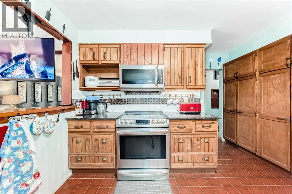 5923 Thorncliffe Drive Nw, Calgary, Alberta  T2K 2Z9 - Photo 6 - A2276899