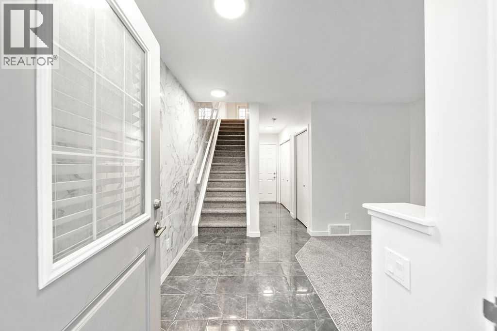 708 Evansridge Common Nw, Calgary, Alberta  T3P 0P3 - Photo 5 - A2274691