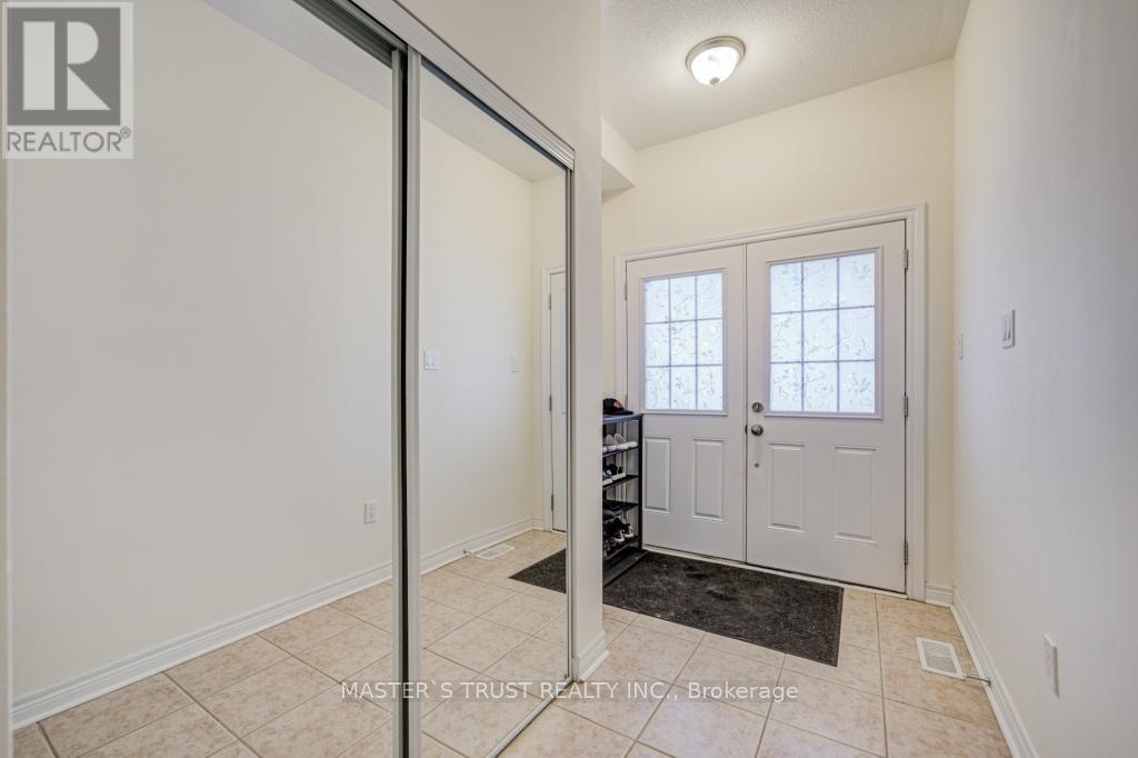 77 Harvest Hills Boulevard, East Gwillimbury, Ontario  L9N 0B4 - Photo 4 - N12712120