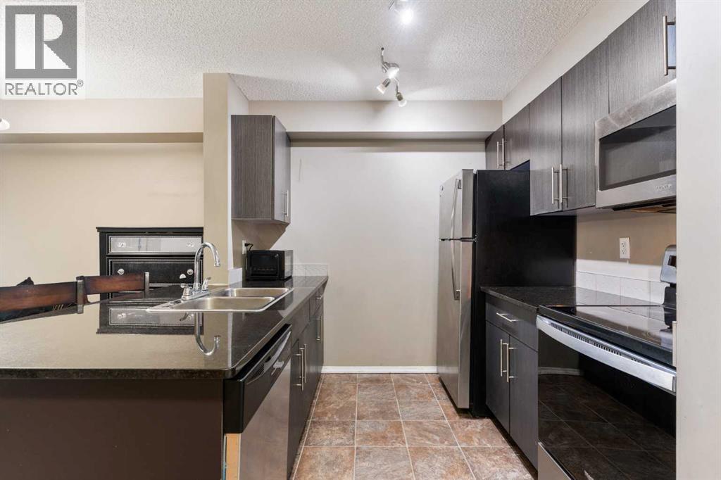 203, 5 Saddlestone Way Ne, Calgary, Alberta  T3J 0S2 - Photo 15 - A2279341