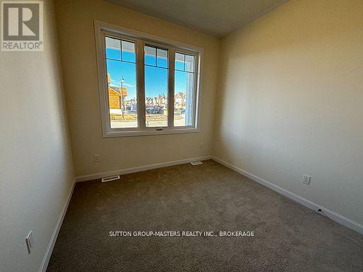 46 Oakmont Drive, Loyalist, Ontario  K0H 1G0 - Photo 23 - X12712250