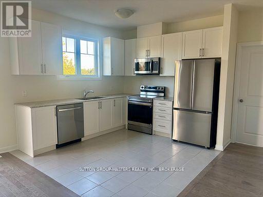 46 Oakmont Drive, Loyalist, Ontario  K0H 1G0 - Photo 5 - X12712250