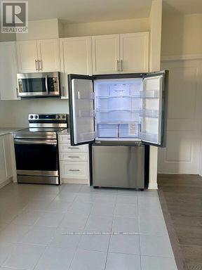 46 Oakmont Drive, Loyalist, Ontario  K0H 1G0 - Photo 6 - X12712250