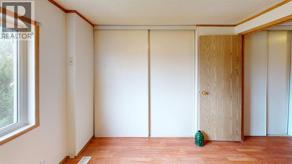 105 Meadowlake Close E, Brooks, Alberta  T1R 1G1 - Photo 11 - A2279919