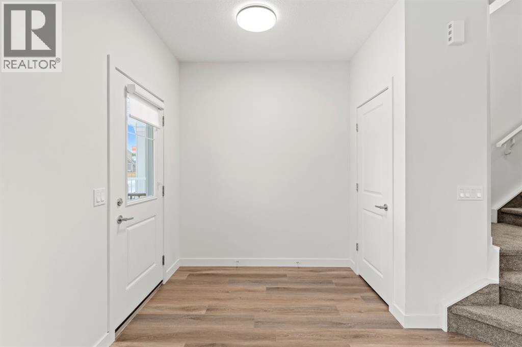 128 Fireside Way, Cochrane, Alberta  T4C 2T1 - Photo 3 - A2275708