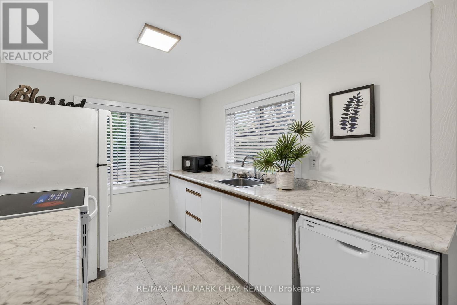 77 Blue Heron Drive, Georgina, Ontario  L0E 1N0 - Photo 5 - N12712652