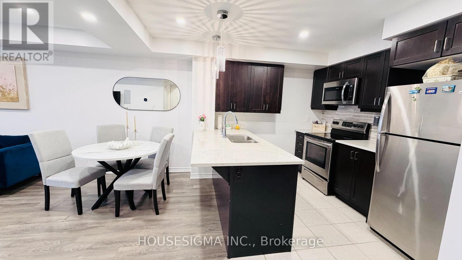 50 - 1222 Rose Way, Milton, Ontario  L9E 1P1 - Photo 4 - W12712588