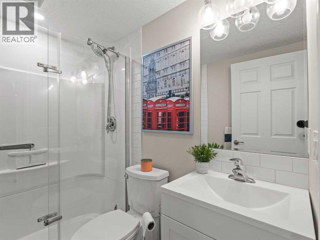 95 Crystal Shores Road, Okotoks, Alberta  T1S 2H9 - Photo 29 - A2277318