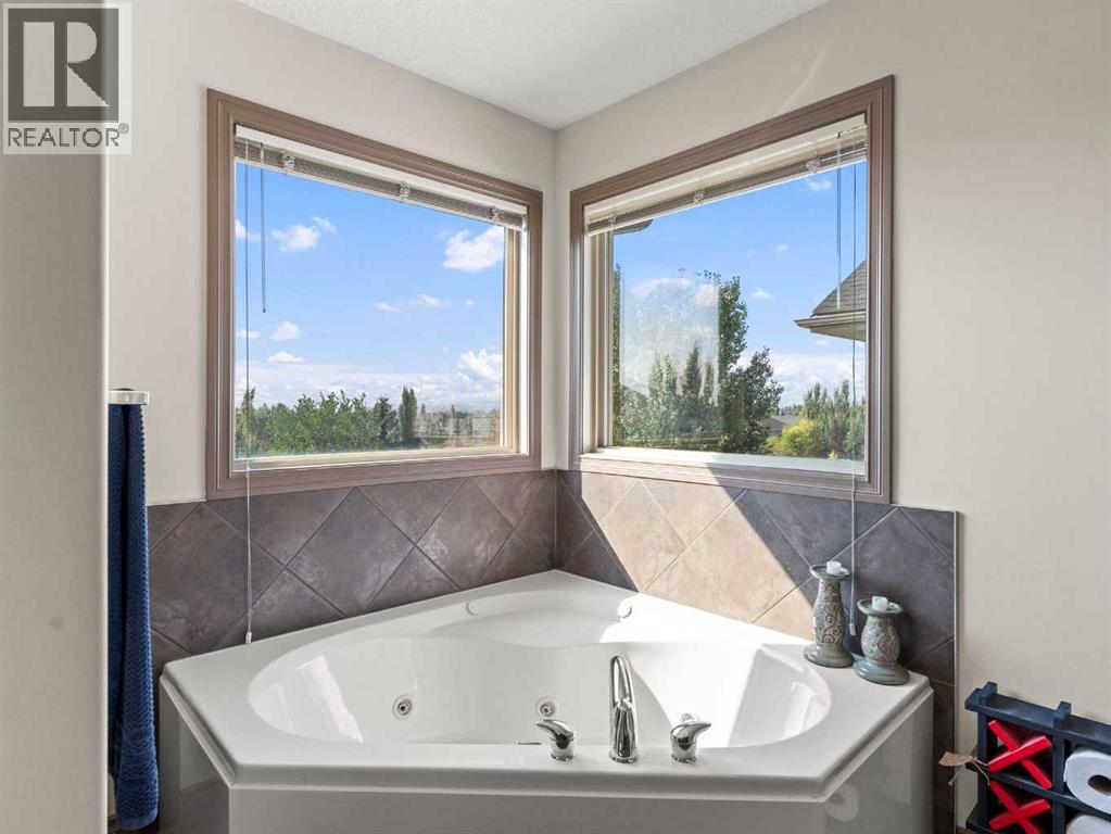 95 Crystal Shores Road, Okotoks, Alberta  T1S 2H9 - Photo 21 - A2277318