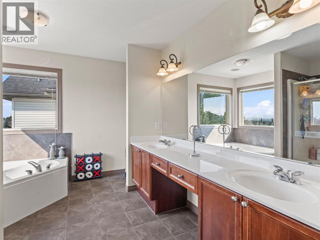 95 Crystal Shores Road, Okotoks, Alberta  T1S 2H9 - Photo 19 - A2277318