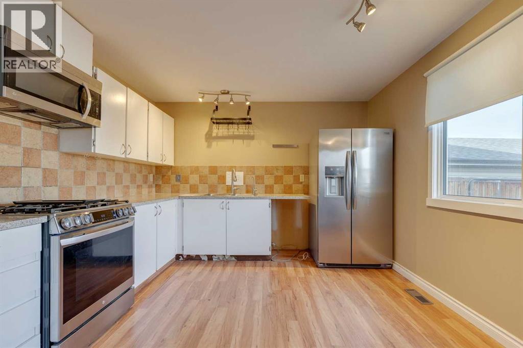 16 Abalone Crescent Ne, Calgary, Alberta  T2A 6Y7 - Photo 8 - A2269468