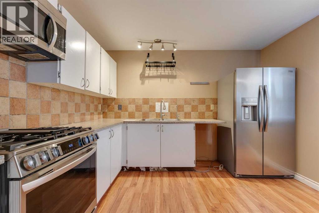 16 Abalone Crescent Ne, Calgary, Alberta  T2A 6Y7 - Photo 7 - A2269468