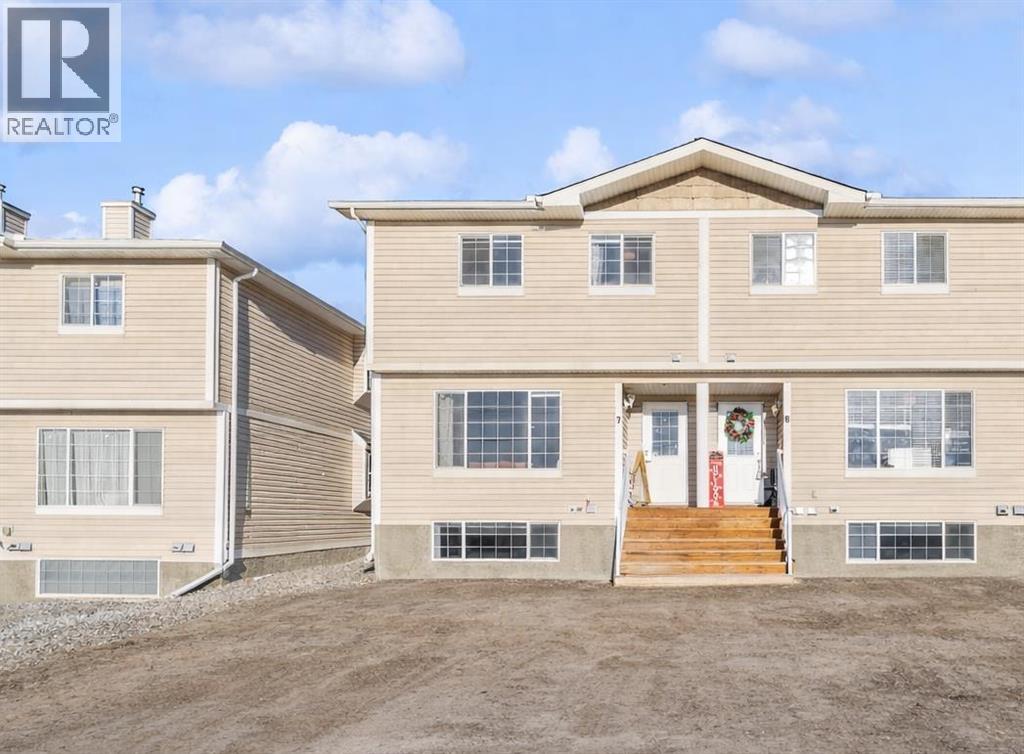 7, 304 Ross Avenue, Cochrane, Alberta  T4C 2J5 - Photo 1 - A2278313