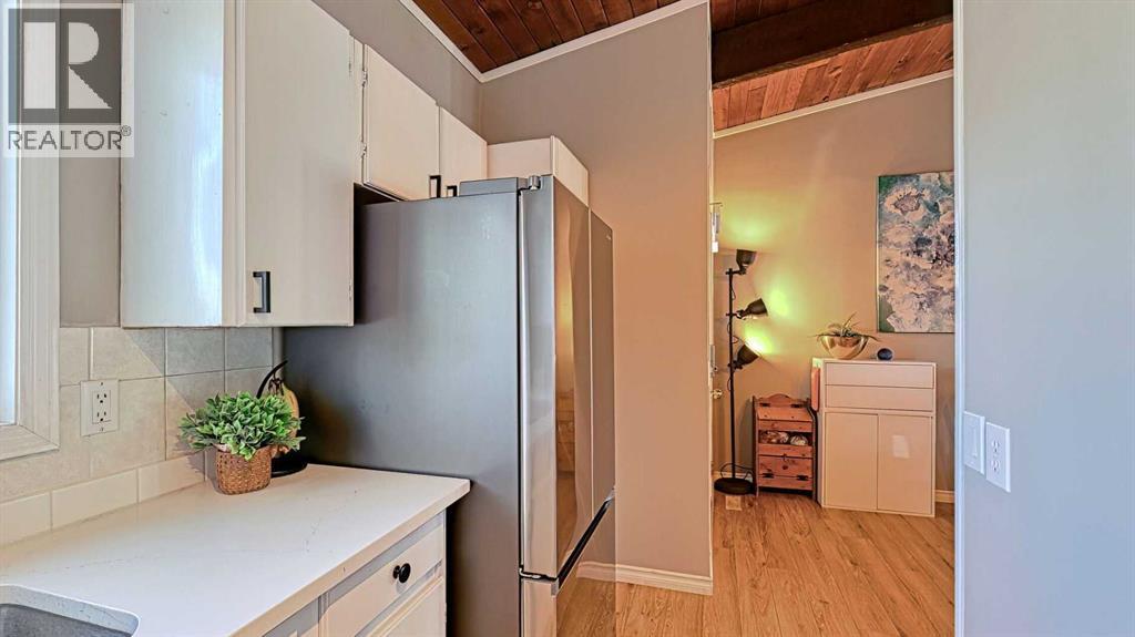 152 Oaktree Lane Sw, Calgary, Alberta  T2V 4E4 - Photo 12 - A2279714