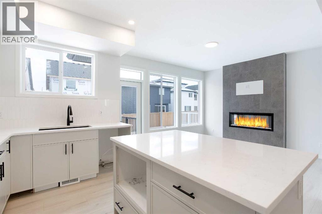 49 Creekside Passage Sw, Calgary, Alberta  T2X 5V6 - Photo 8 - A2279243