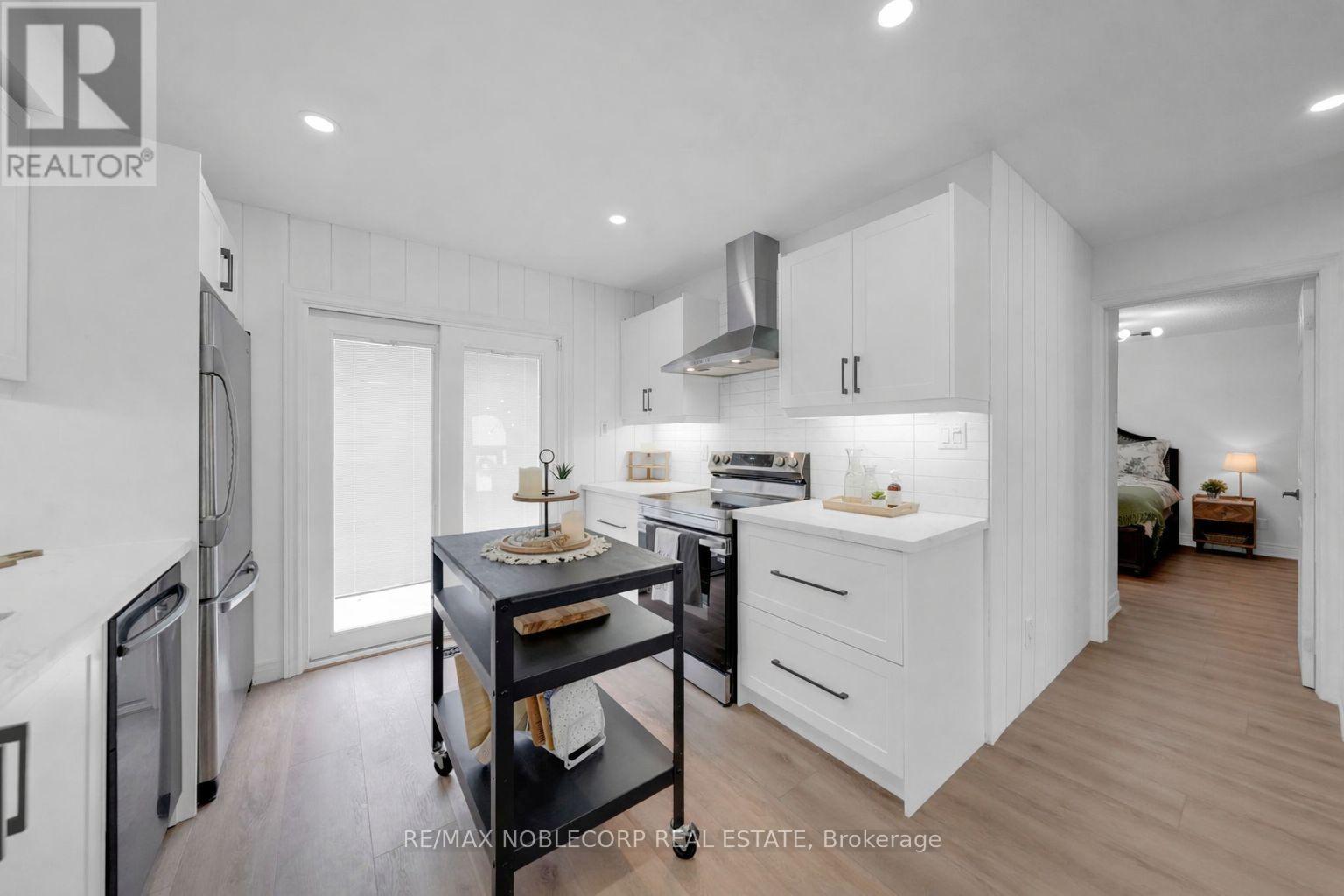 76 Edenbridge Drive, Essa, Ontario  L3W 0K8 - Photo 10 - N12713890