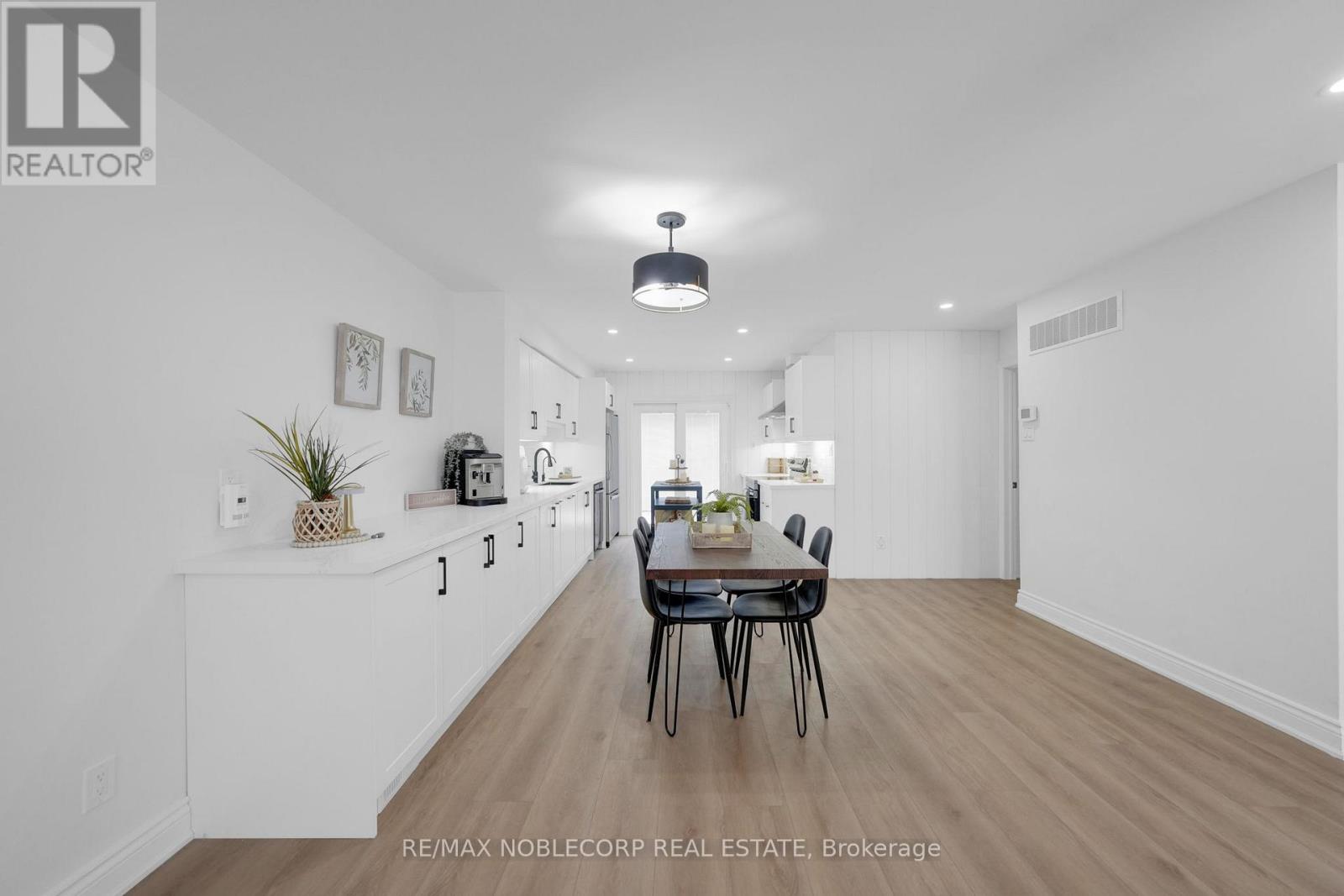 76 Edenbridge Drive, Essa, Ontario  L3W 0K8 - Photo 7 - N12713890