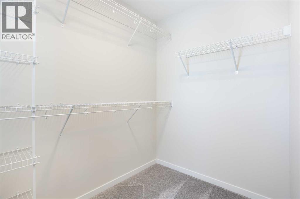 53 Creekside Passage Sw, Calgary, Alberta  T2X 5V6 - Photo 29 - A2279223