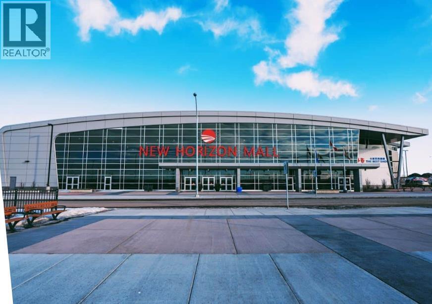 H09, 260300 Writing Creek Crescent, Balzac, Alberta  T4A 0X8 - Photo 1 - A2245386