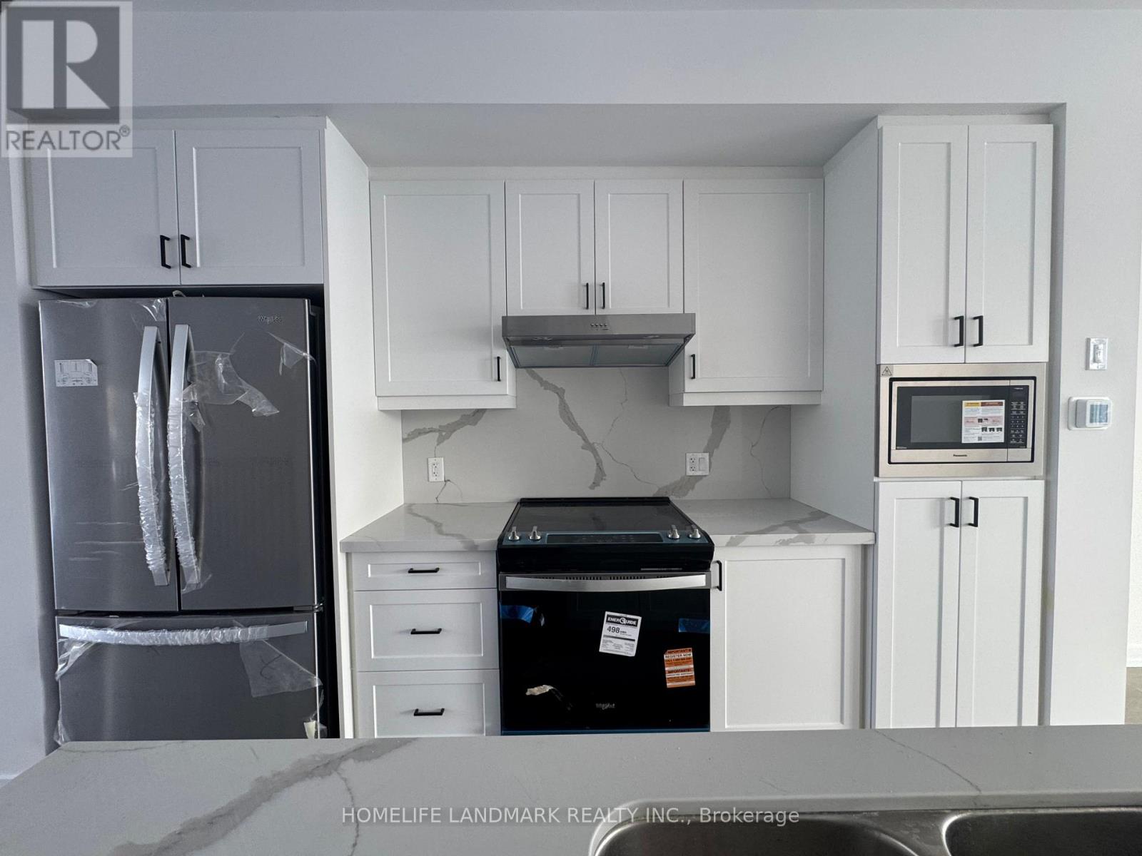 27 Bancroft Lane, Richmond Hill, Ontario  L4E 1M1 - Photo 7 - N12546526