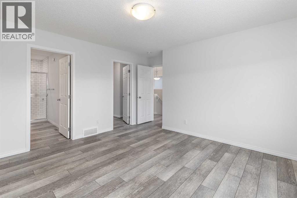 40 Sundown Avenue, Cochrane, Alberta  T4C 2T3 - Photo 19 - A2278921