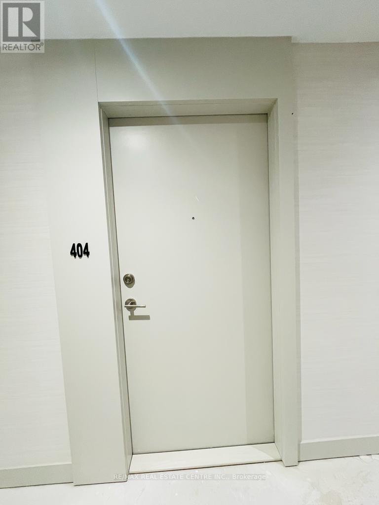 404 - 225 Veterans Drive, Brampton, Ontario  L7A 5L7 - Photo 2 - W12714848