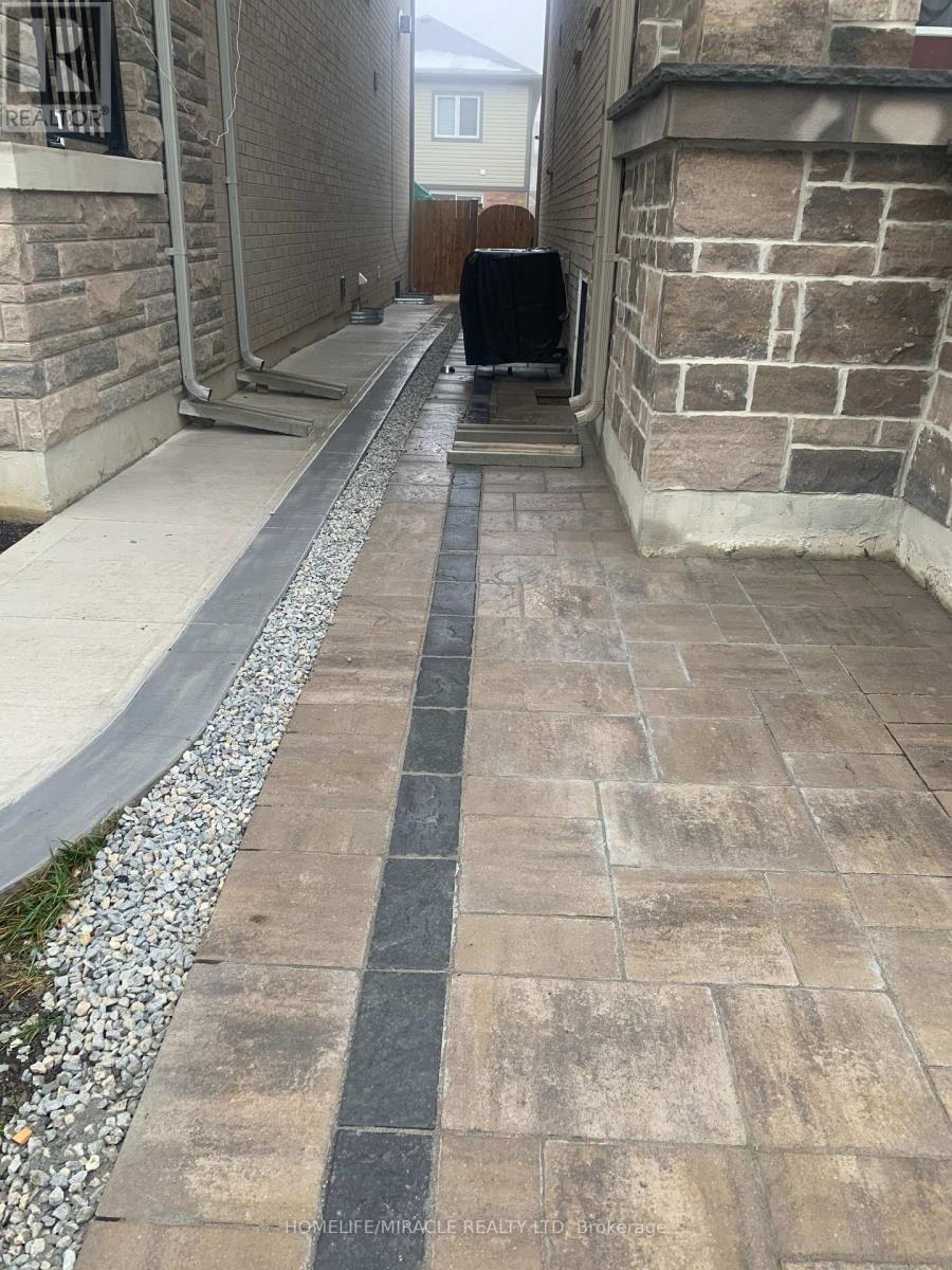 90 Roulette Crescent, Brampton, Ontario  L7A 0G4 - Photo 6 - W12713322