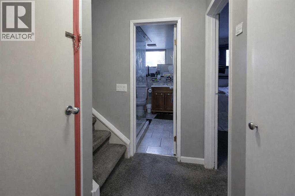 102 Dalgleish Bay Nw, Calgary, Alberta  T3A 1K8 - Photo 22 - A2280097