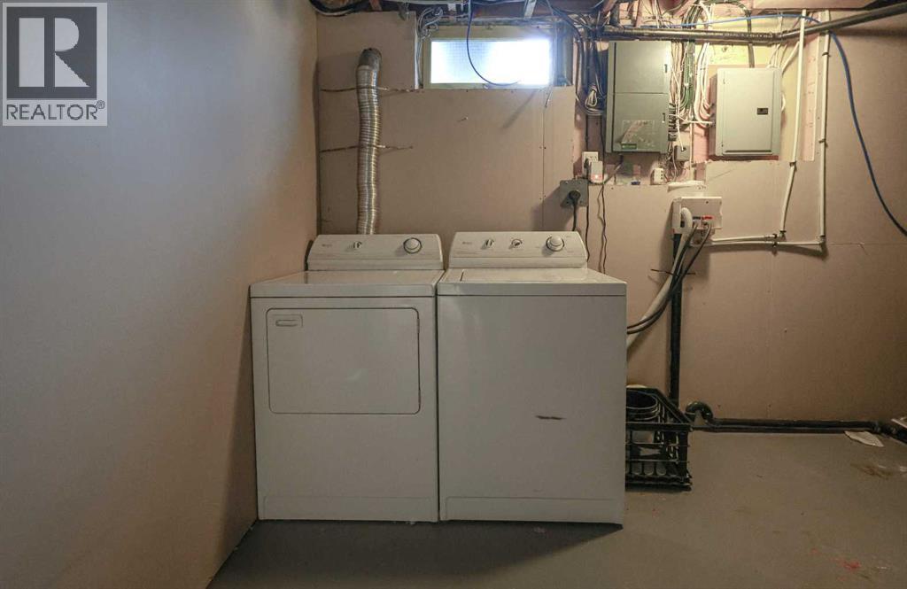 102 Dalgleish Bay Nw, Calgary, Alberta  T3A 1K8 - Photo 33 - A2280097