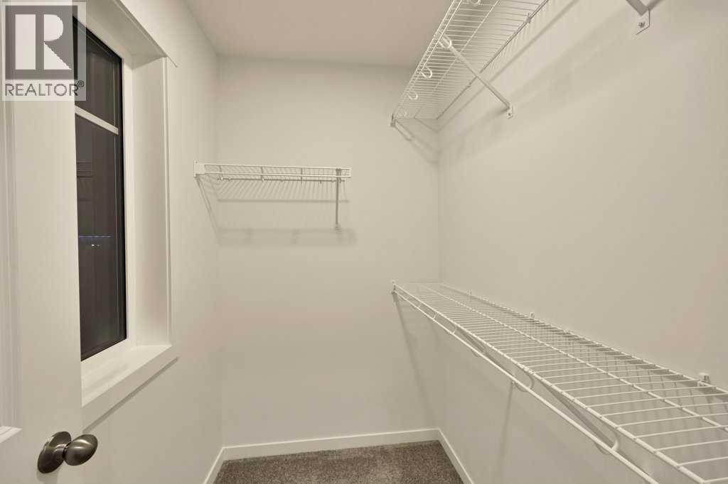 561 Chelsea Gardens, Chestermere, Alberta  T1X 2V4 - Photo 32 - A2280508