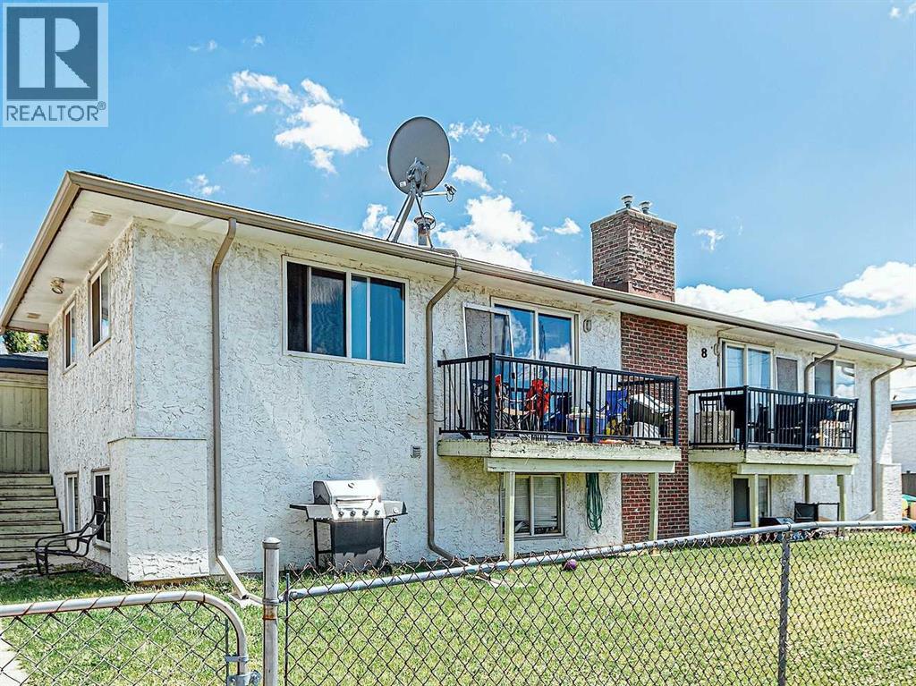 1-6, 8 Huntley Close Ne, Calgary, Alberta  T2K 4Z3 - Photo 2 - A2244388