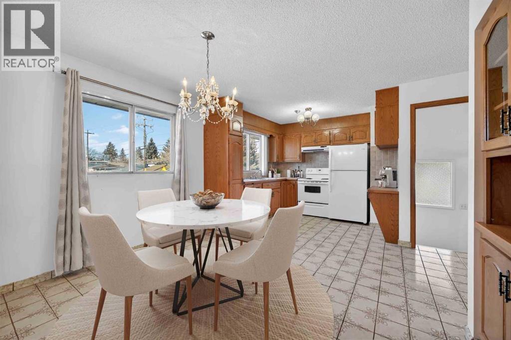 7228 Huntridge Hill Ne, Calgary, Alberta  T2K 4A5 - Photo 8 - A2279509