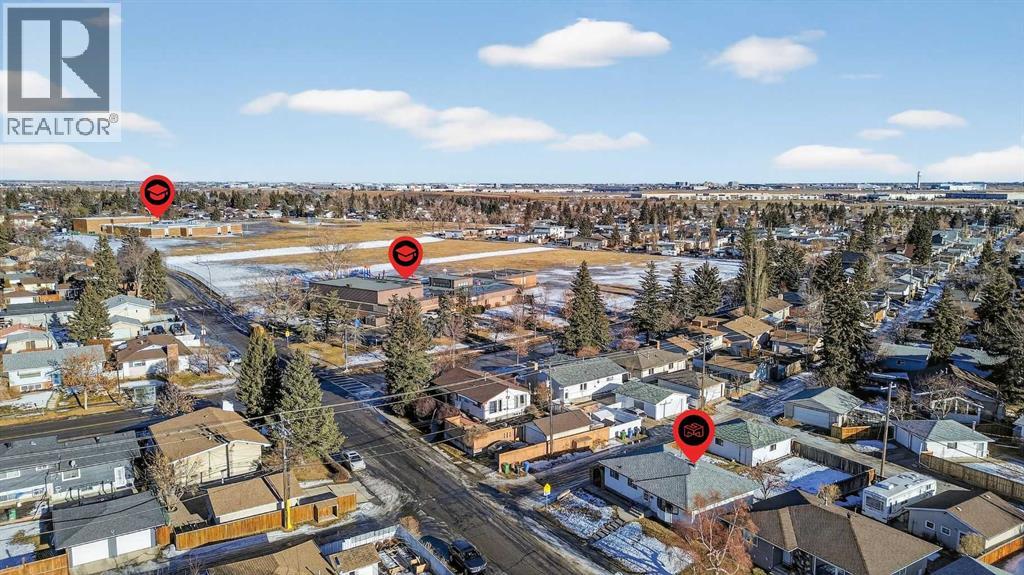 7228 Huntridge Hill Ne, Calgary, Alberta  T2K 4A5 - Photo 37 - A2279509