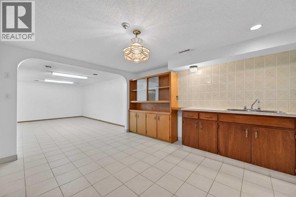 7228 Huntridge Hill Ne, Calgary, Alberta  T2K 4A5 - Photo 29 - A2279509