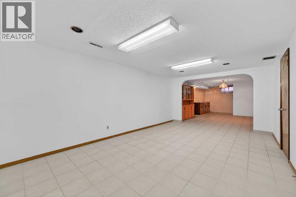 7228 Huntridge Hill Ne, Calgary, Alberta  T2K 4A5 - Photo 32 - A2279509