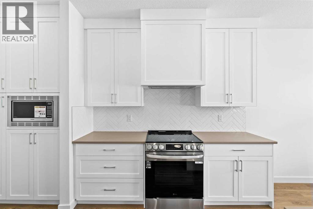 1003, 201 Cooperswood Green Sw, Airdrie, Alberta  T3B 3Y6 - Photo 9 - A2276002