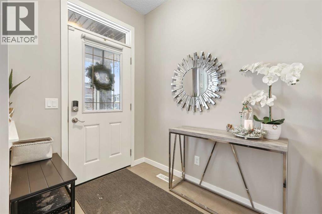 754 Belmont Drive Sw, Calgary, Alberta  T2X 4H4 - Photo 4 - A2275855