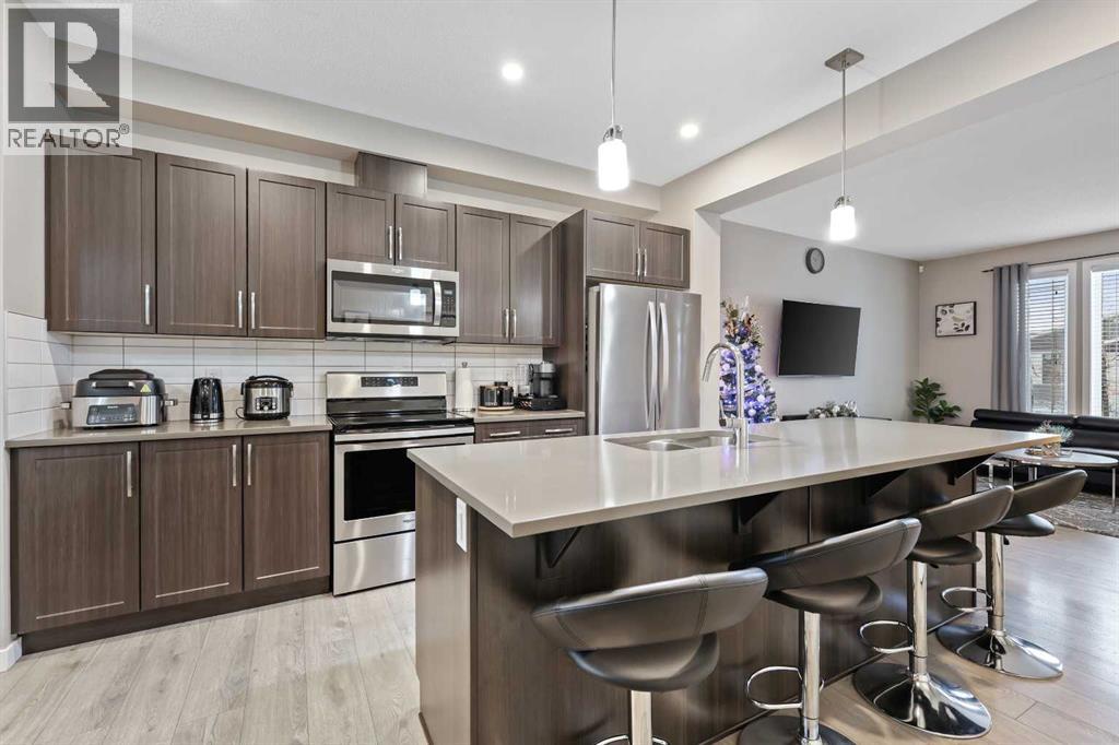 754 Belmont Drive Sw, Calgary, Alberta  T2X 4H4 - Photo 13 - A2275855