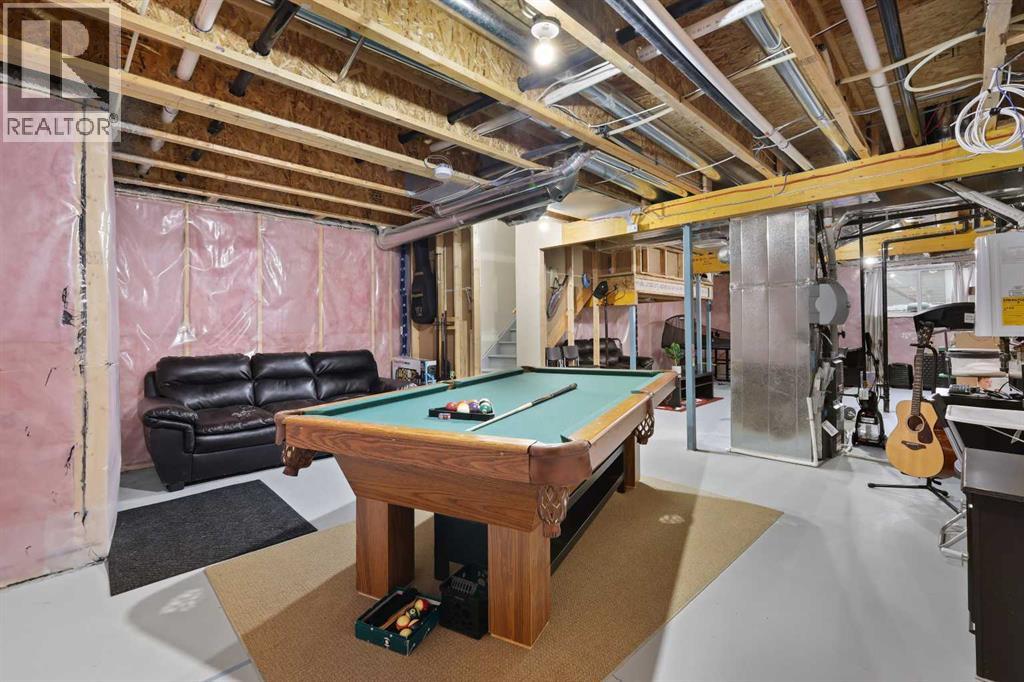 754 Belmont Drive Sw, Calgary, Alberta  T2X 4H4 - Photo 35 - A2275855