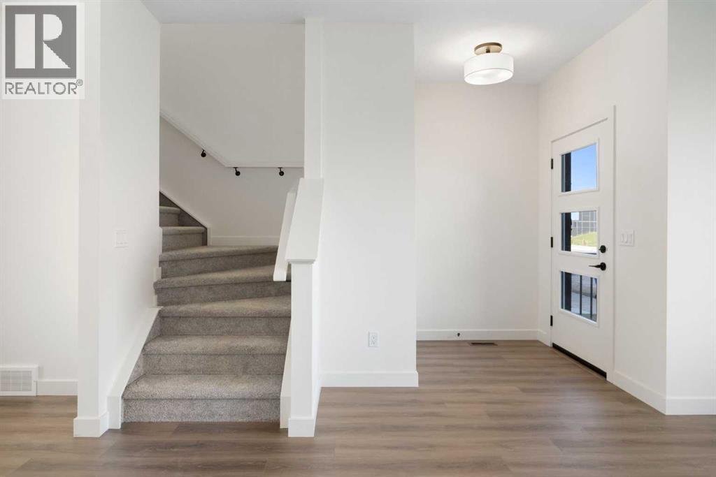 215 Belvedere Avenue Se, Calgary, Alberta T2A 8A1 - Photo 4 - A2265805