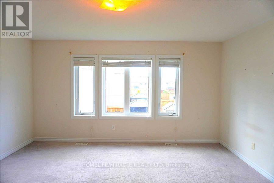 76 Wagner Crescent, Essa, Ontario  L0M 1B6 - Photo 6 - N12715634