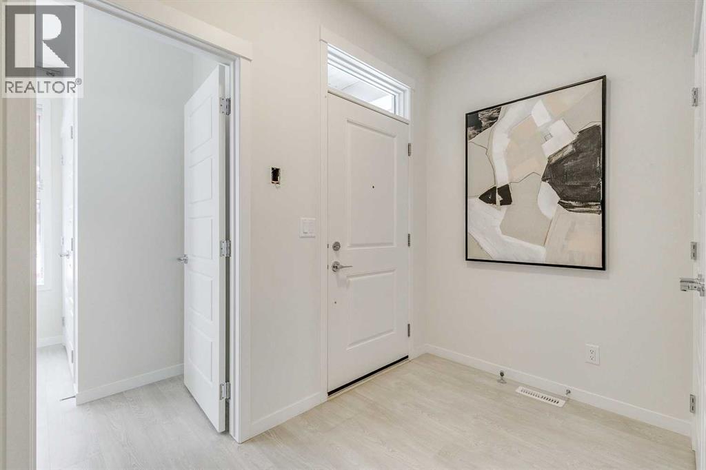 80 Lucas Common Nw, Calgary, Alberta  T3P 2B4 - Photo 7 - A2272511