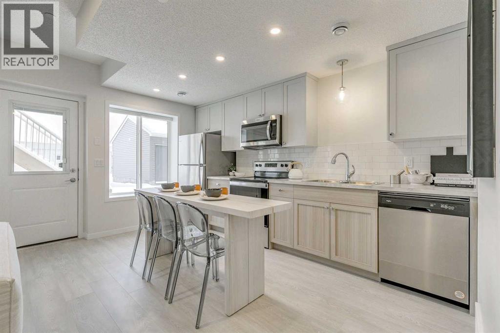 80 Lucas Common Nw, Calgary, Alberta  T3P 2B4 - Photo 5 - A2272511