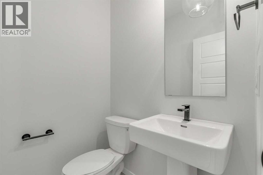 186 Creekside Manor Sw, Calgary, Alberta  T2X 6J5 - Photo 19 - A2272147