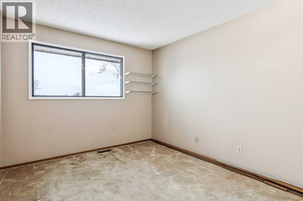 16 Bedwood Rise Ne, Calgary, Alberta  T2K 2T6 - Photo 28 - A2277584