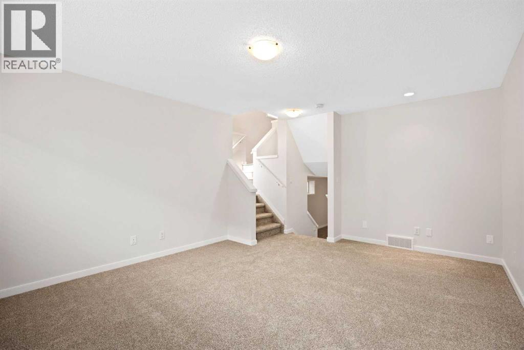 131 New Brighton Landing Se, Calgary, Alberta  T2Z 0S7 - Photo 18 - A2280351