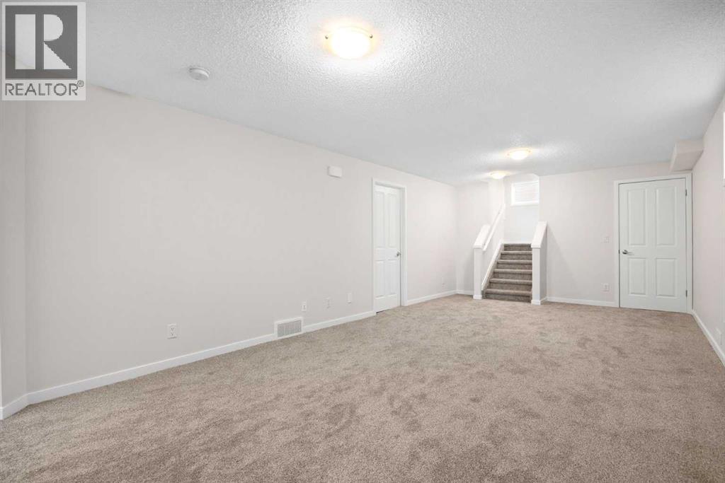 131 New Brighton Landing Se, Calgary, Alberta  T2Z 0S7 - Photo 20 - A2280351