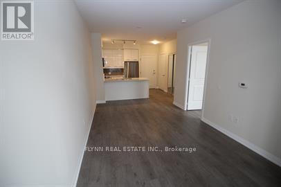 301 - 65 Watergarden Drive, Mississauga, Ontario  L5R 0G9 - Photo 3 - W12716082