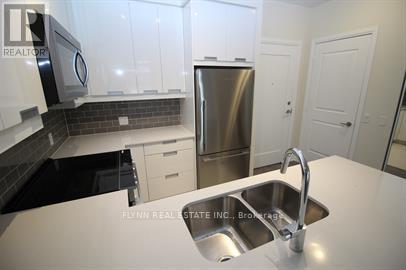 301 - 65 Watergarden Drive, Mississauga, Ontario  L5R 0G9 - Photo 5 - W12716082